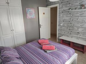 Posteľ alebo postele v izbe v ubytovaní VolKKanrentals Casa Chinijo