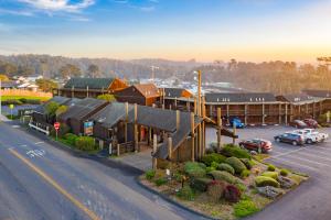 an aerial view of a building with a parking lot at Harbor Lite Lodge in Fort Bragg
