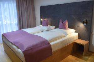 Letto o letti in una camera di Gasthof Ramona