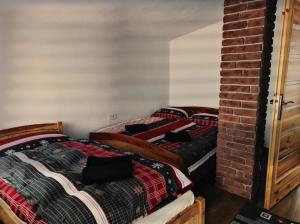 Posteľ alebo postele v izbe v ubytovaní Apartmán Vladimír