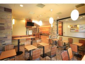 a restaurant with tables and chairs in a room at R&B HOTEL HIGASHI NIHONBASHI - Vacation STAY 40472v in Tokyo