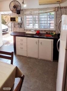 Η κουζίνα ή μικρή κουζίνα στο Merlo 1