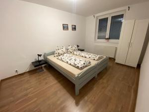 Ein Bett oder Betten in einem Zimmer der Unterkunft Rodinný Dom Ratnovce