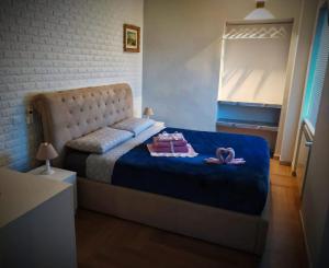 Ein Bett oder Betten in einem Zimmer der Unterkunft CA MATILDE
