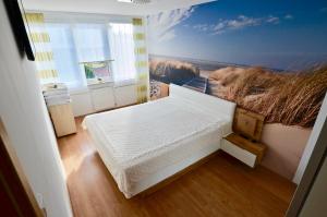 Posteľ alebo postele v izbe v ubytovaní Apartament Piaskowy Jantar 2