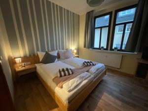 Postel nebo postele na pokoji v ubytování Pension Lindenhof
