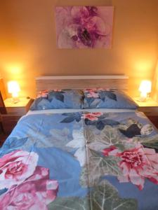 מיטה או מיטות בחדר ב-Pilis Apartman