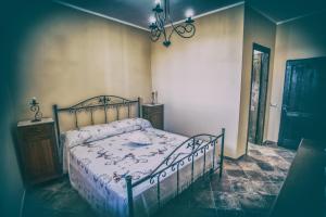Katil atau katil-katil dalam bilik di La Dimora di Giano