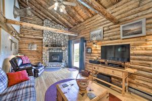 A television and/or entertainment centre at Pet-Friendly New York Cabin with Hot Tub and Game Room