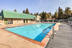 a large swimming pool with blue water at Epic Lake Tahoe Getaway Heavenly Daze Chalet in Stateline