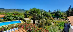 an aerial view of a resort with a swimming pool at Hostal La Maravilla in Vilches