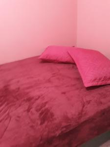 Ένα ή περισσότερα κρεβάτια σε δωμάτιο στο PORTO APARTAMENTO