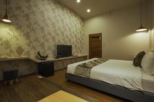 Postel nebo postele na pokoji v ubytování Yesday B&B