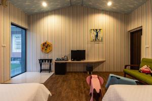 TV a/nebo společenská místnost v ubytování Yesday B&B