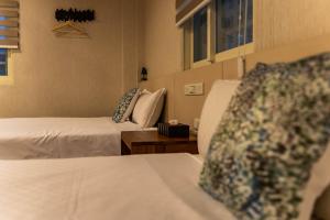 Postel nebo postele na pokoji v ubytování Yesday B&B