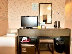TV a/nebo společenská místnost v ubytování Resort Inn Marion Shinano