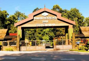 a garage with a sign that reads jamelines bar at Marina Hotel Kemaman in Kampong Kemaman
