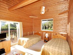 Μια τηλεόραση ή/και κέντρο ψυχαγωγίας στο 伊豆大島 ホテル赤門