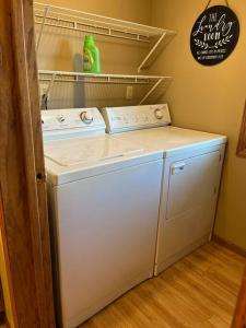 a washer and dryer in a laundry room at Close to Duluth! Centrally Located-Lake Superior Minutes Away! in Superior