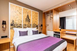 Postel nebo postele na pokoji v ubytování The Halich Hotel Istanbul Karakoy - Special Category