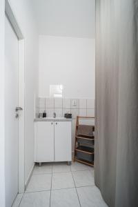 Kuchyň nebo kuchyňský kout v ubytování Apartment Yogiam