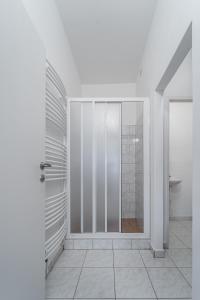 Koupelna v ubytování Apartment Yogiam