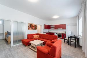 Posezení v ubytování Apartment Yogiam + 7 fotografií