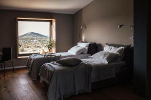 Postel nebo postele na pokoji v ubytování Villas Misto + 37 fotografií