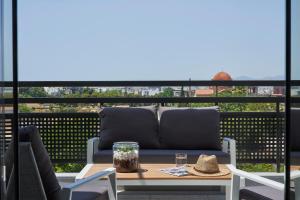 A balcony or terrace at NLH KERAMEIKOS - Neighborhood Lifestyle Hotels