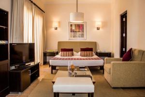 A seating area at JAZ Neo Saraya Palms