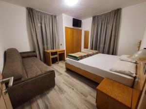 Postel nebo postele na pokoji v ubytování Al Toscana