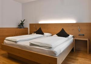 Voodi või voodid majutusasutuse Hotel Toblacherhof toas