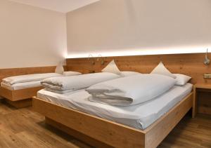 Voodi või voodid majutusasutuse Hotel Toblacherhof toas