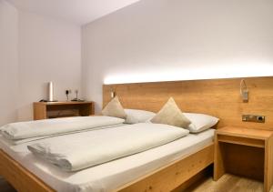 Voodi või voodid majutusasutuse Hotel Toblacherhof toas