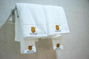 a towel on a towel rack in a bathroom at SAMI HOTEL in Ouagadougou
