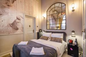 A bed or beds in a room at BpR R20 Studio Home with A/C