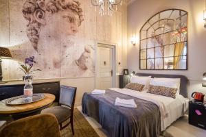 A bed or beds in a room at BpR R20 Studio Home with A/C