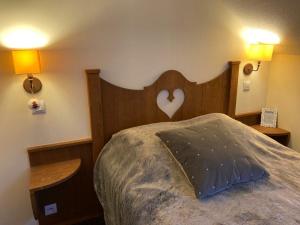 Katil atau katil-katil dalam bilik di Le Refuge de L'alpaga - Superbe appartement au pied des pistes avec Parking gratuit.