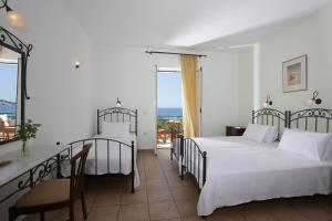 Voodi või voodid majutusasutuse Brazzera Hotel toas