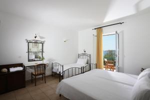 Voodi või voodid majutusasutuse Brazzera Hotel toas