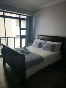 Postel nebo postele na pokoji v ubytování 208 Coral Reef