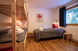 Postel nebo postele na pokoji v ubytování Bella Riva by Arosa Holiday