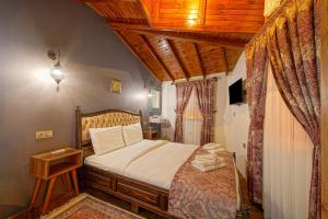 Ένα ή περισσότερα κρεβάτια σε δωμάτιο στο Affan Boutique Hotel
