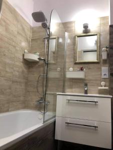 Kúpeľňa v ubytovaní Apartament Datini, 40 m2