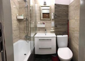 Kúpeľňa v ubytovaní Apartament Datini, 40 m2