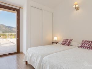 Postel nebo postele na pokoji v ubytování Casa lluna + 6 fotografií