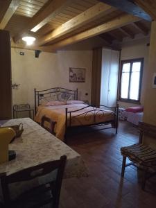 Postel nebo postele na pokoji v ubytování Agriturismo Trebis + 37 fotografií