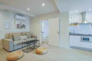 Kuchyň nebo kuchyňský kout v ubytování Apartamentos Magna Sevilla