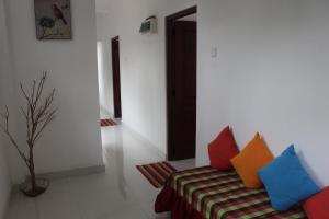 Area soggiorno di Alex Home Stay
