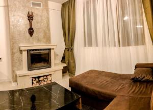 Et opholdsområde på Луксозен Апартамент Мечи Чал - Апартхотел Манастира 2